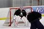 Buffalo Sabres' Jordan Leopold (3) shoots on New York Rangers goalie Martin Biron during an informal NHL hockey practice in Amherst, N.Y., Monday, Sept. 24, 2012.